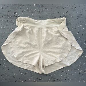 White/cream lululemon running shorts, size: 2